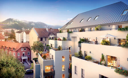 Projet neuf en ville avec vue montagne